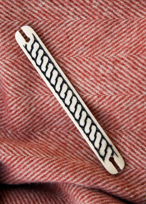 Luinen kudontasukkula, punossomisteinen